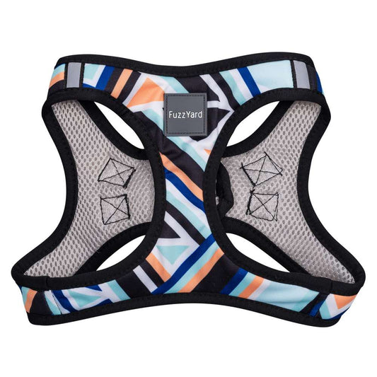 FuzzYard Step-in Dog Harness (Sonic) with colorful geometric stripes, black mesh, and reflective accents.
