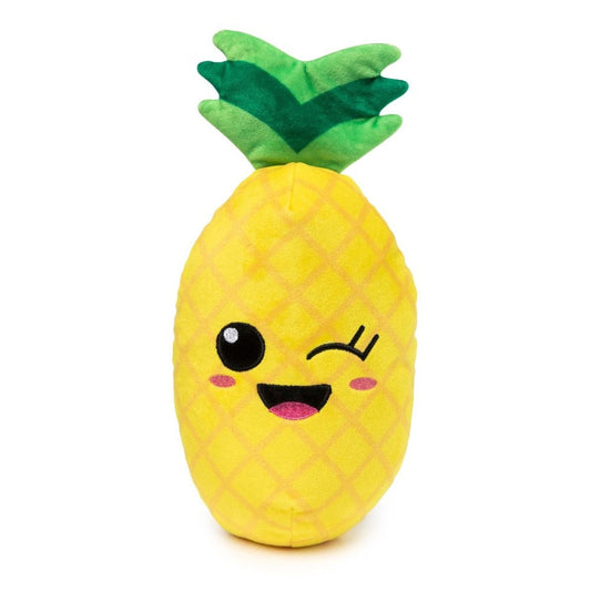 Yellow plush pineapple dog toy with green leaves and a winking, smiling face.